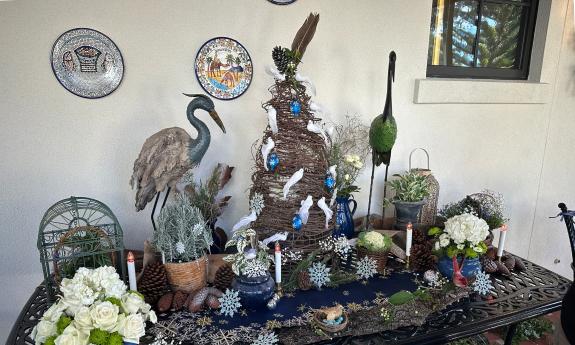 A seasonal display on a patio table, created for the 2025 Tour of Homes