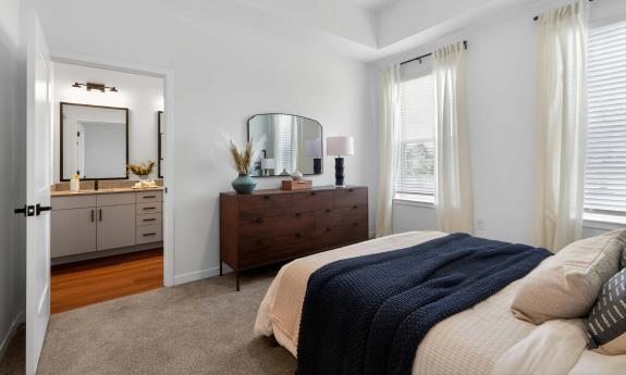 A bedroom with en suite bath