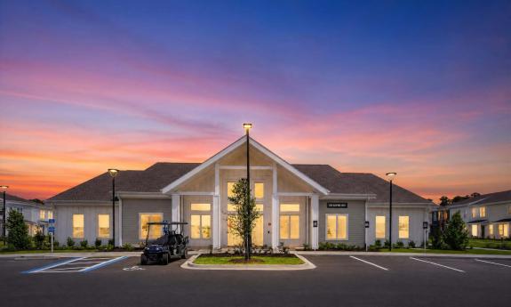 The clubhouse at sunset at a new apartment complex
