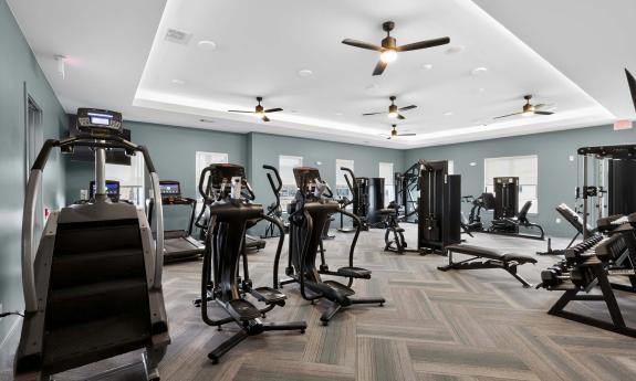 The fitness centr at Rise St. Augustine has a vaulted ceiling