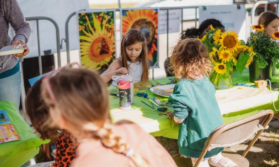 Kids participating in crafts outside