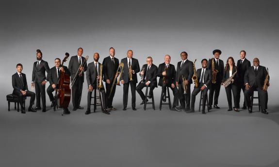 The members of the Jazz at Lincoln Center Orchestra lined up with their instruments, with Wynton Marsalis in the center