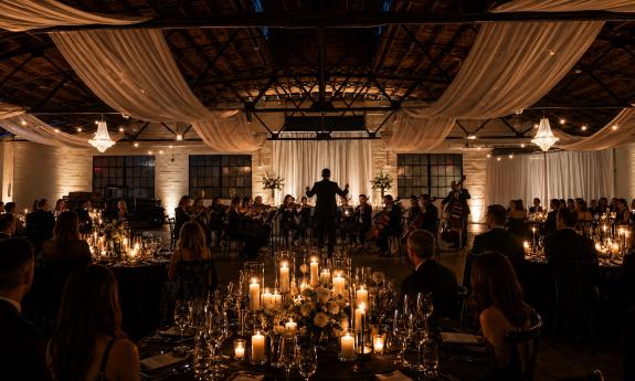 A live orchestra performing inside The Venue