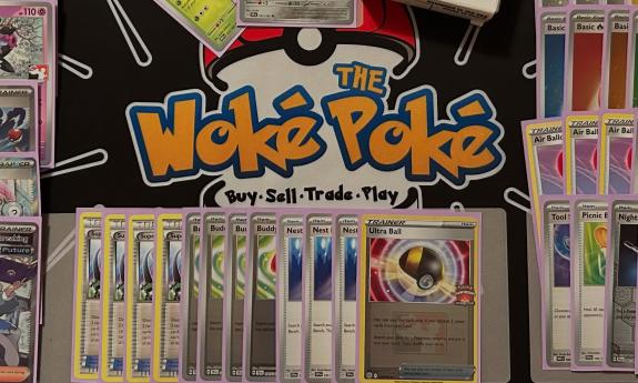Pokémon cards laid out on a table