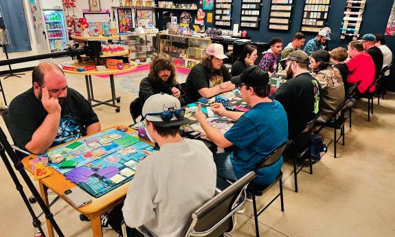 A gathering of people playing games at the shop