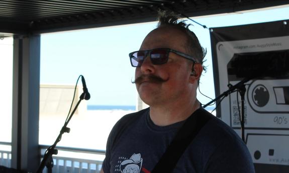 Ben Haley, performing aboard a tour boat