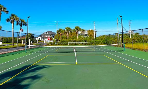 The tennis courts at Four Winds condos