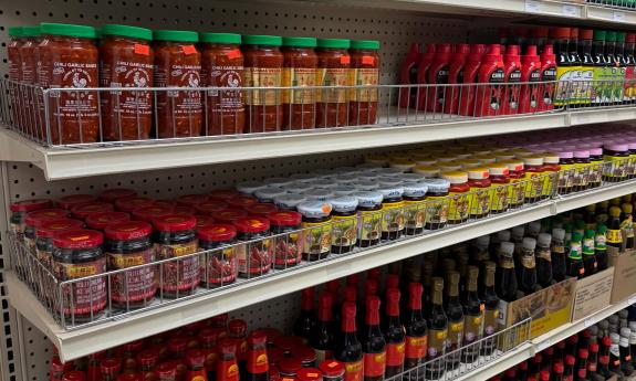 Various sauces stacked on the shelves