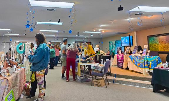 The Mystic Faire features booths sellling items