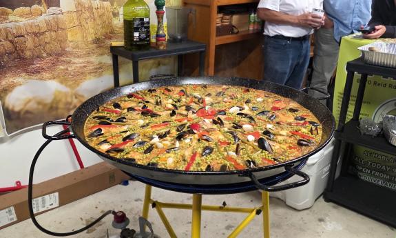 Paella being cooked at an event