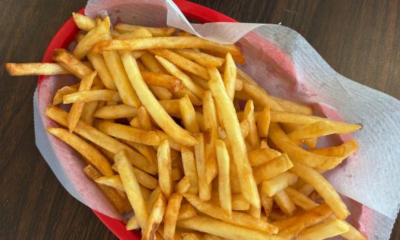 A side order of fries on a tray