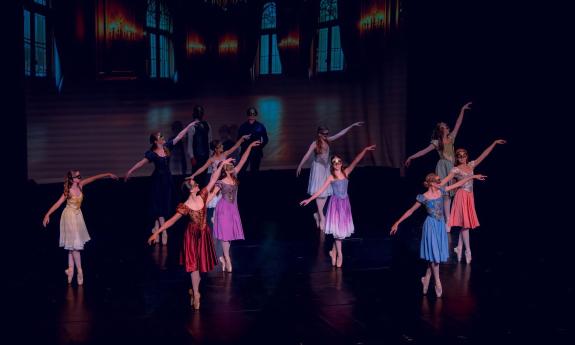 A group of dancers performing in unison