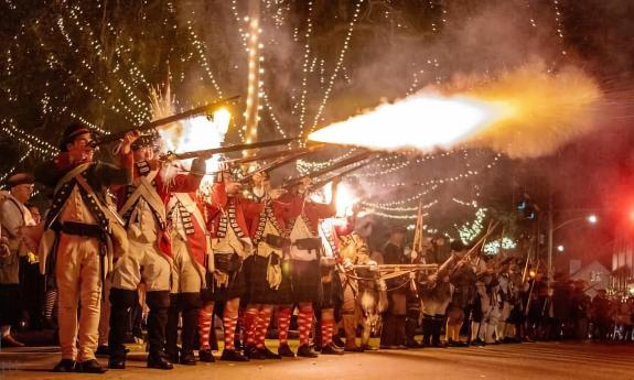 Florida militia firing muskets for the start of the Christmas season
