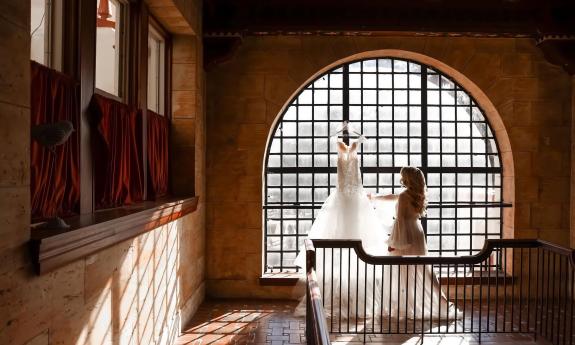 A bride admiring her wedding dress