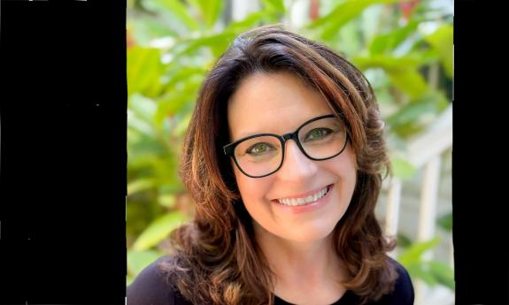Author Meg Cabot against greenery