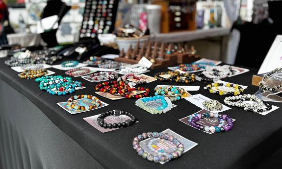 Colorful bracelets on a black display table