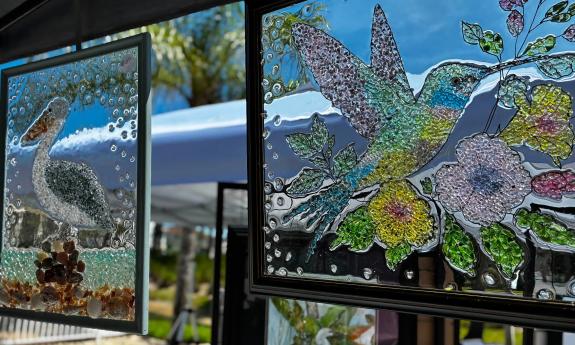 Glass art hanging in an open window