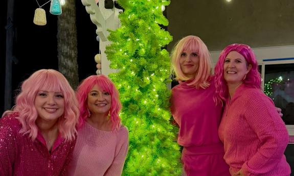 Four guests for a Barbie themed tour dressed all in pink