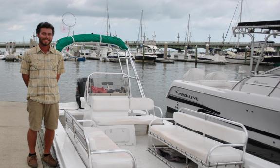 Our friendly and knowledgeable guide, Joe, and the boat.