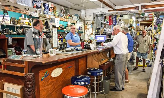 Customers checking out at the marine store counter