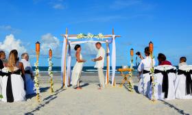 Couple getting married at the beach 