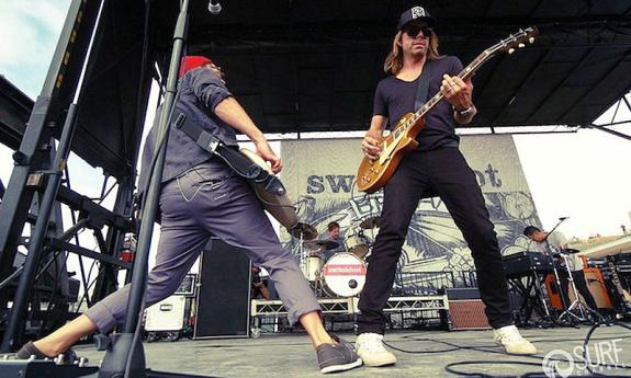 Switchfoot performs on stage. 