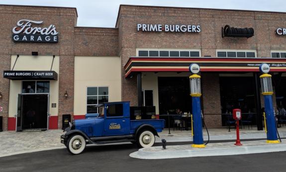 Ford's Garage, with antique gas pumps, garage doors, and Model-A Pick-up Truck in St. Augustine.