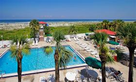 The Guy Harvey St. Augustine Beach Resort hosts the annual Give Kids the World Fundraiser poolside.