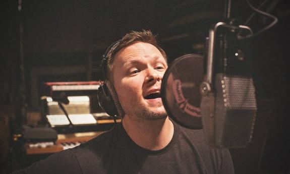 Matt Fowler singing in a recording studio