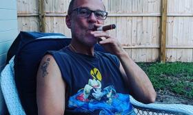 Mark Chirico smoking a cigar