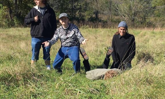 Home Is Where group photo in a field