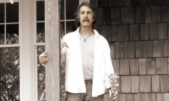 Crawford Boyd standing on a porch