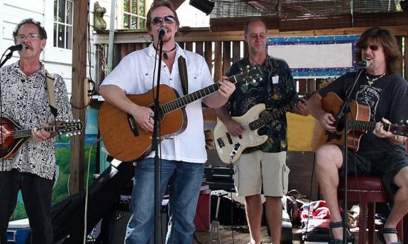 Jason Lawrence Jones performing with a band.