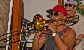 Bryant Paterson on Trombone and Alexis Fonseca on Keyboard of the JAX English Salsa Band 