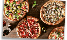 View of different pizzas offered by Mellow Mushroom