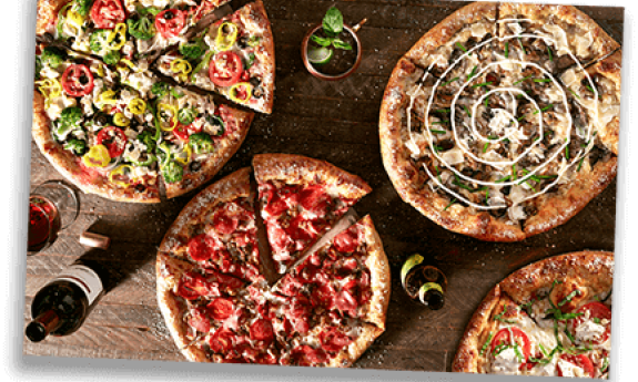 View of different pizzas offered by Mellow Mushroom