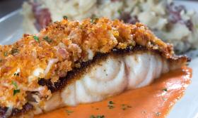 The Andouille Crusted Grouper served at Harry's Seafood Bar and Grille in St. Augustine.