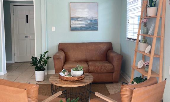 Alms + Fare offers a comfortable seating area and tables in a cozy corner in St. Augustine.