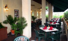 Outdoor seating at Amici Italian Restaurant in St. Augustine.