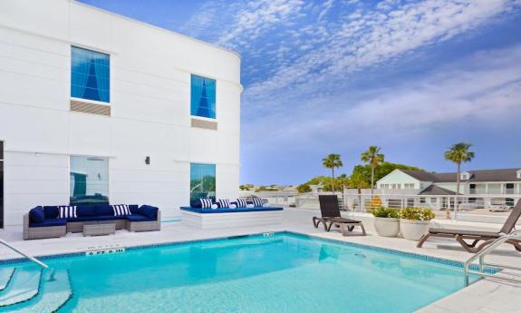 Enjoy a BLVD evening cocktail at the pool deck on Anastasia Island in St. Augustine, Florida.