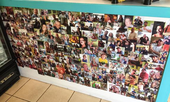 This counter features photos of patrons who have dined at Zaba's