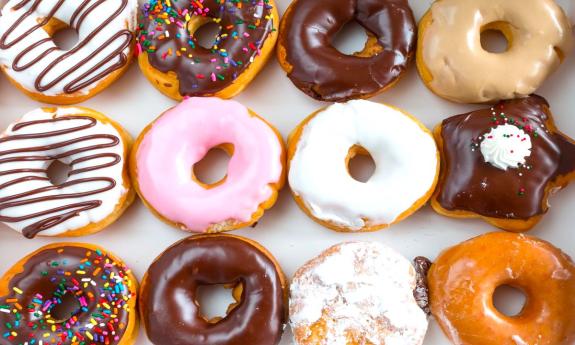 A variation of glazed and frosted donuts