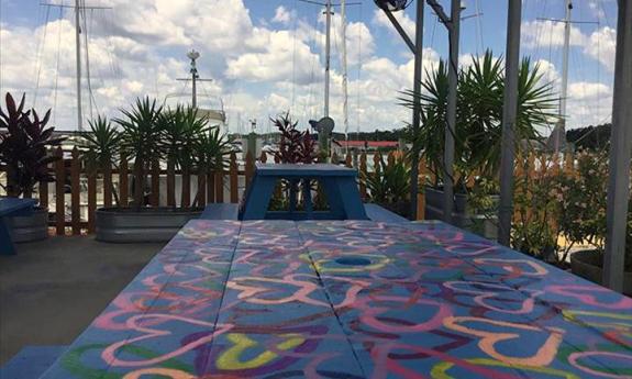 Guests may dine outside with a view of the San Sebastian River at Elevate Food Truck in St. Augustine.