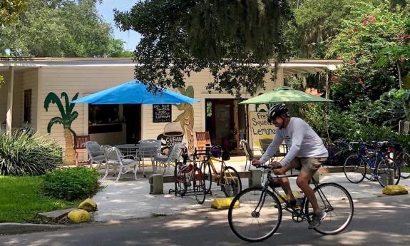 Bicycling by the Fountain of Juice in St. Augustine, FL.