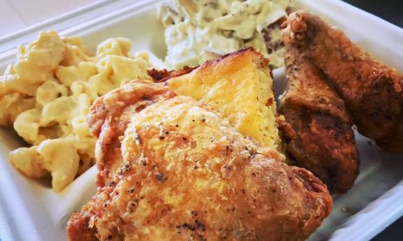 Fried Chicken Kitchen's mwal with two salads and cornbread in St. Augustine.