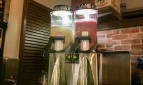 A machine churns frozen margaritas and frozen sangria at the St. Augustine Coffee House.