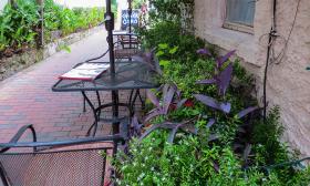 Outdoor seating at Gaufre's & Goods on Charlotte St. in St. Augustine, FL.