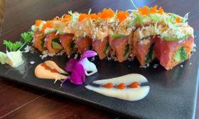 Sushi and garnishes presented on a plate 