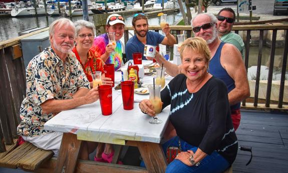 Group of people eating outside at Hurricane Patty's in St. Augustine