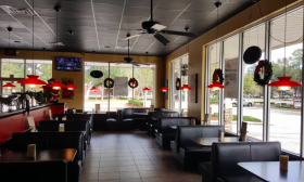 Inside seating at Brucci's Pizza in Fruit Cove, Florida